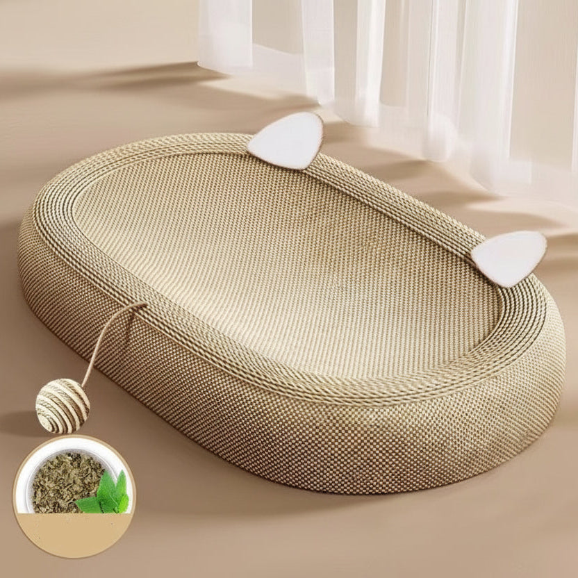 Oval woven pet bed with catnip on a beige surface